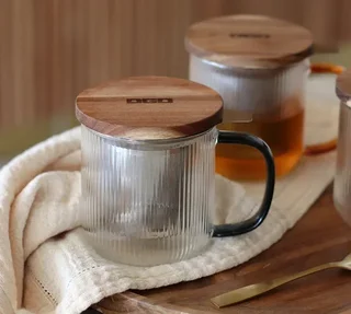 Τσαγιέρι γυάλινο OGO Living 300 ml, απόχρωση γκρι καπνού, με καπάκι ακακίας.